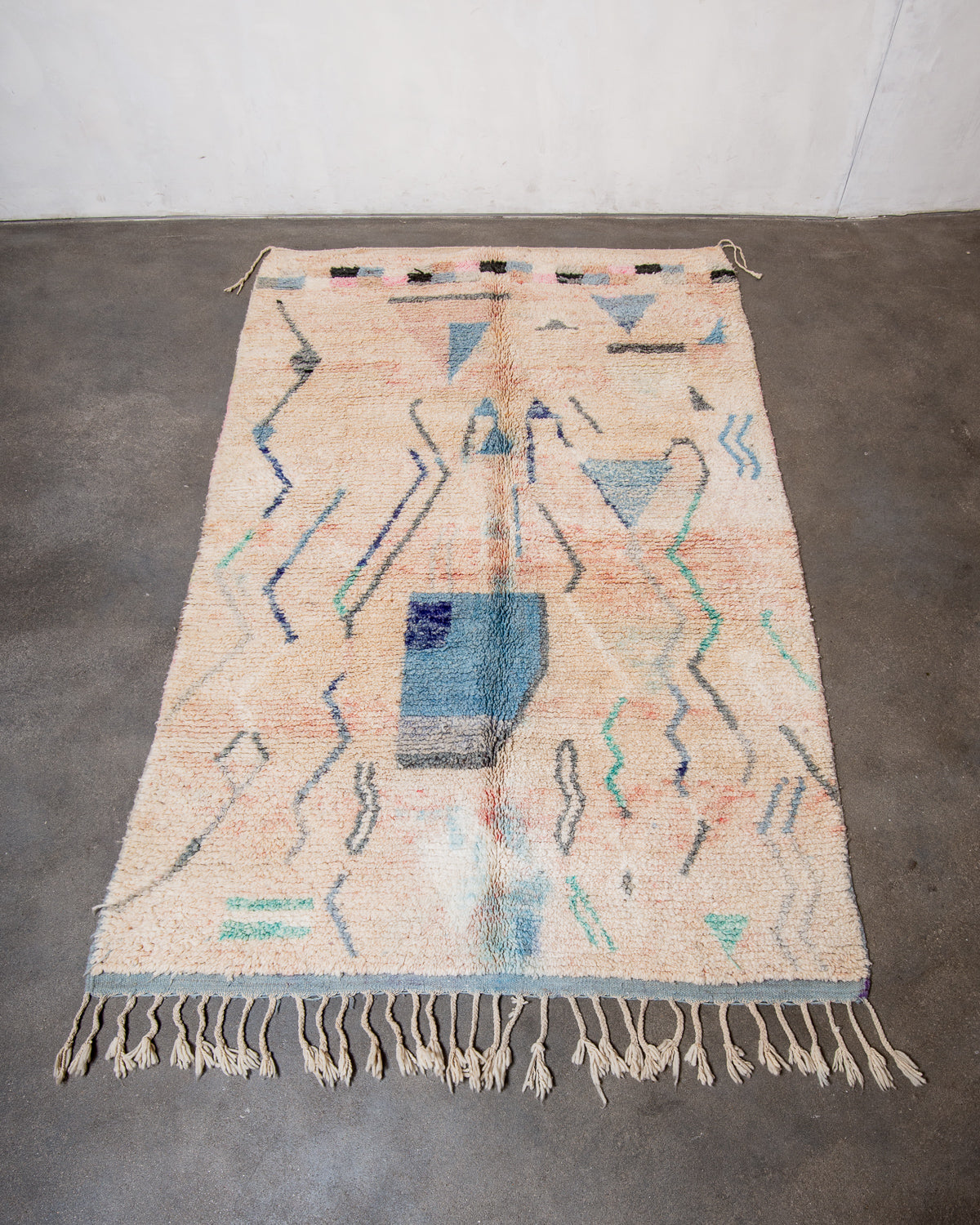 Modern, designer, handcrafted Berber rug from Morocco. Vintage carpet with beautiful colours and patterns and fluffy texture.